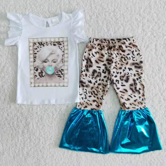 B4-13 Girl blowing bubbles in white leopard suit